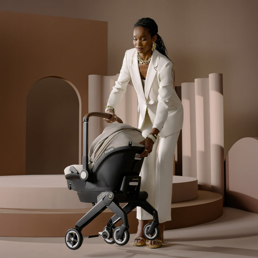 Limited Edition Shyft? DualRide? Infant Car Seat + Stroller Combo with Green & Gentle? Fabric
